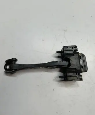 Front door check strap stopper
