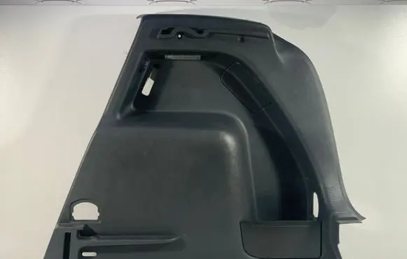 Trunk/boot lower side trim panel