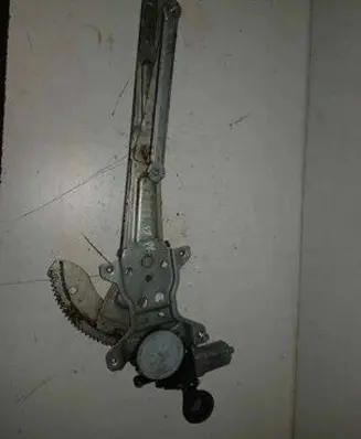 Suzuki Swift I Rear door window regulator with motor 3460-63J00