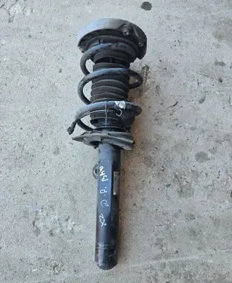 Front shock absorber with coil spring