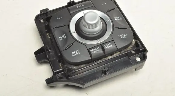 Renault Megane III Central console control unit 253B02542R