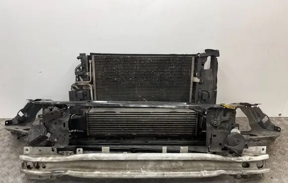 Radiator support slam panel
