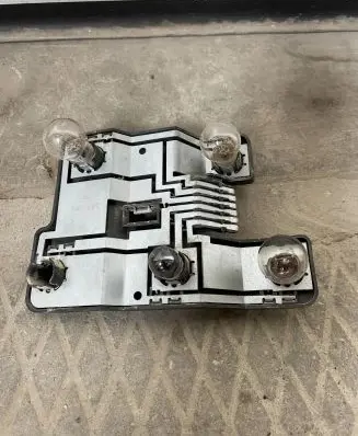 Opel Astra F Tail light bulb cover holder 394448