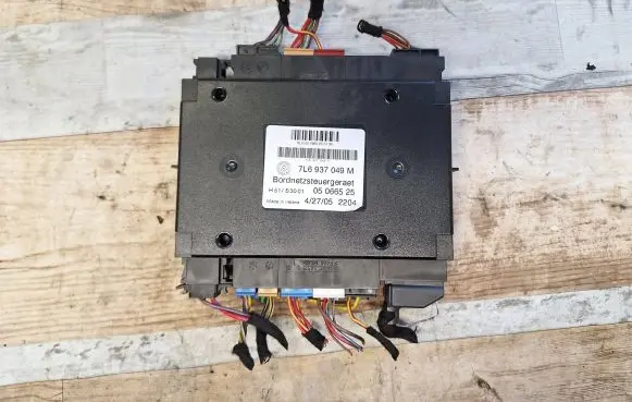 Volkswagen Touareg I Comfort/convenience module 7L6937049M 05066525 H51S3001