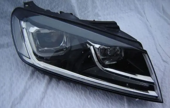 Volkswagen Touareg II Headlight/headlamp 7P1941034A