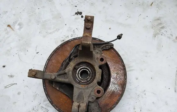 Front wheel hub spindle knuckle