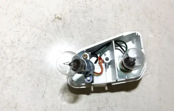 Mazda 626 Tail light bulb cover holder 0431397