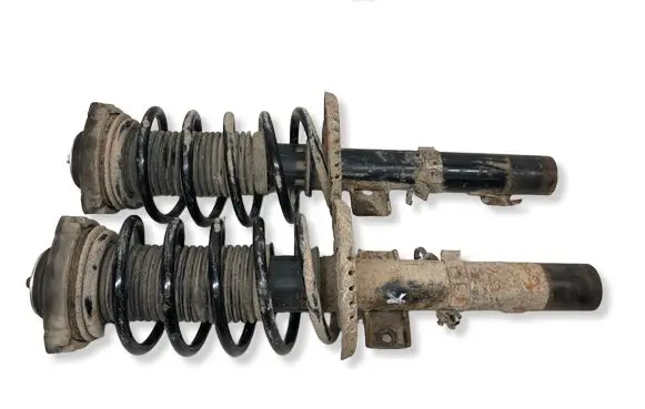 Volkswagen Fox Front shock absorber with coil spring 5Z0413031C