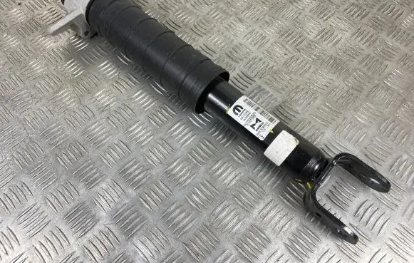 Jeep Grand Cherokee WL Rear shock absorber/damper 68417124AC