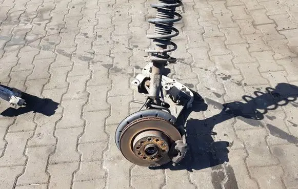 Front wheel hub spindle knuckle