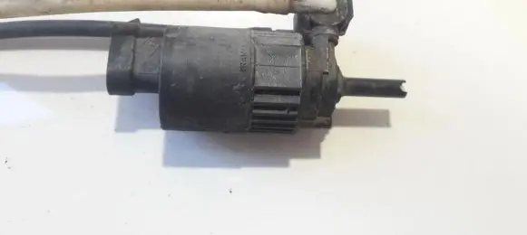 Renault Megane I Windscreen/windshield washer pump 7700821782