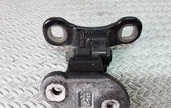 Rear door upper hinge