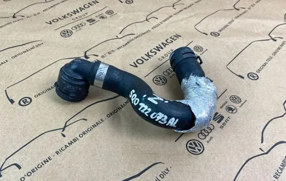 Volkswagen Golf VII Engine coolant pipe/hose 5Q0122073AL