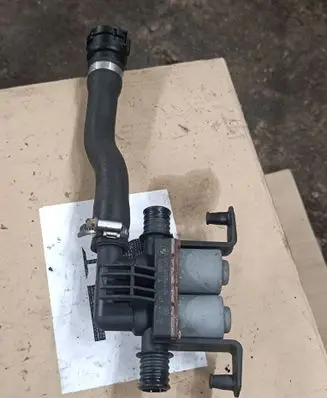 Coolant heater control valve