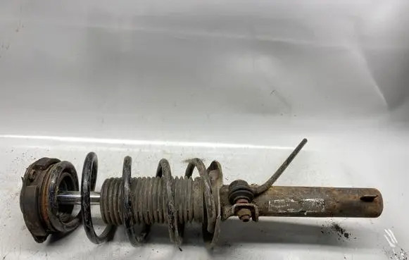 Volkswagen Golf VI Front shock absorber with coil spring 1k0400054ge