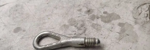 Towing hook eye