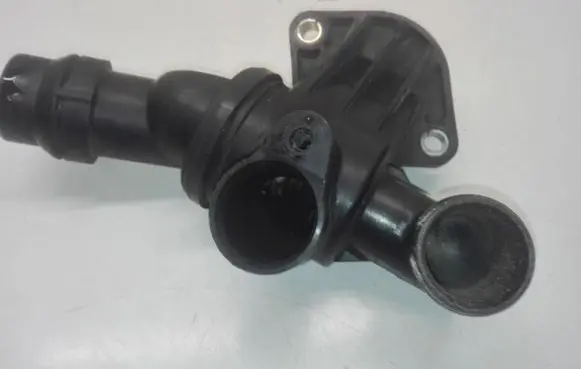Thermostat/thermostat housing