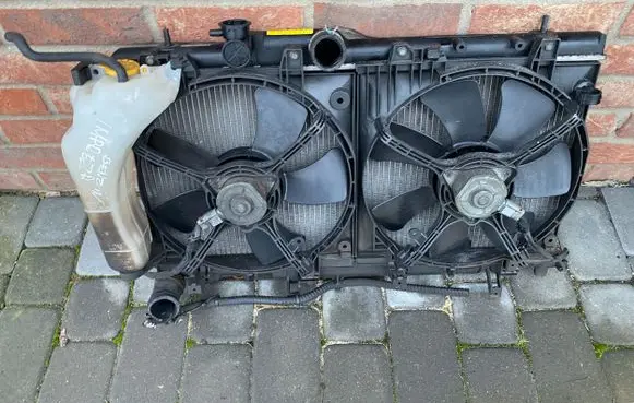 Subaru Impreza II Radiator set 