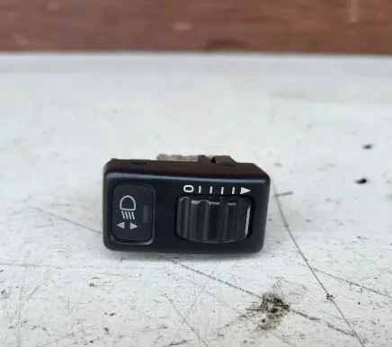 Headlight level height control switch