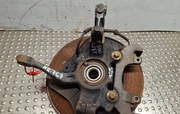 Front wheel hub spindle knuckle