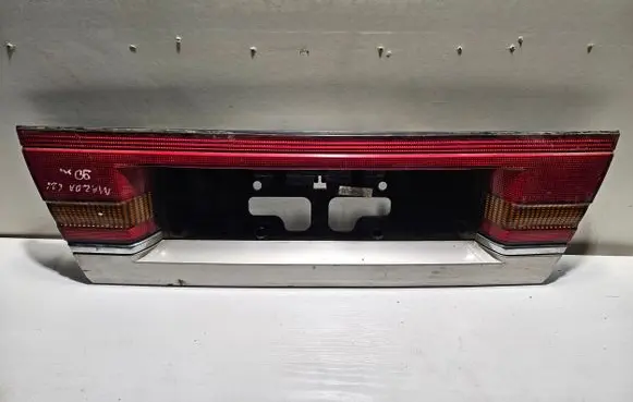 Mazda 626 Rear light center trim bar blend 