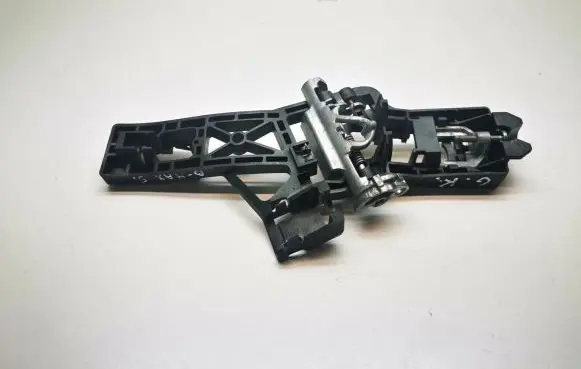 Rear door exterior handle/bracket