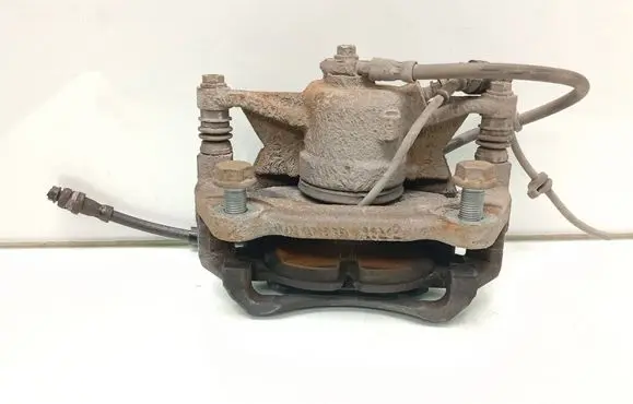 Volkswagen Golf VII Front brake caliper