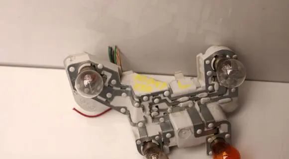 Volvo V50 Tail light bulb cover holder 
