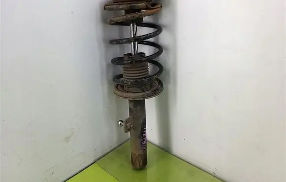 Peugeot Partner III Front shock absorber with coil spring