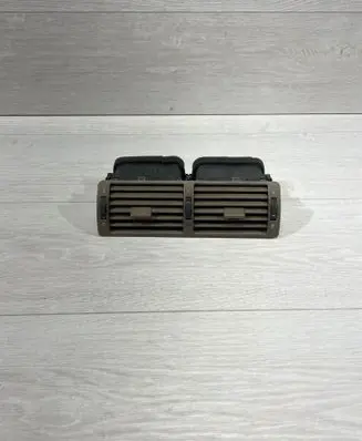 Dash center air vent grill
