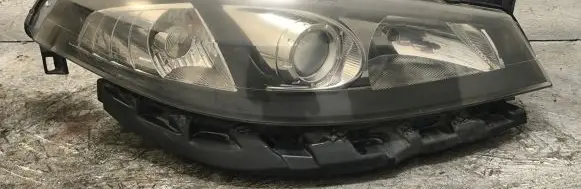 Renault Laguna II Headlight/headlamp 89900766