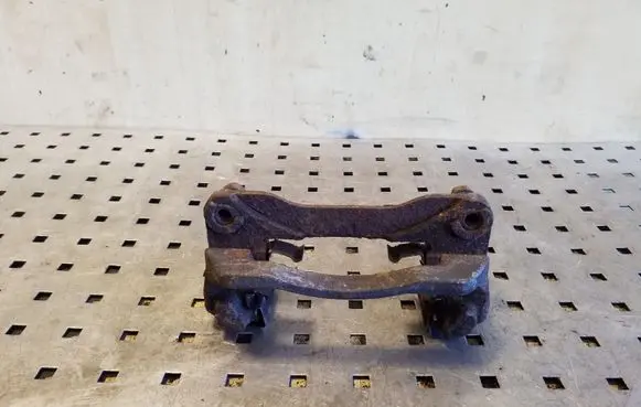 Subaru Legacy Brake caliper pad carrier rear 