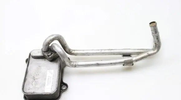 Skoda Octavia Mk2 (1Z) Oil filter mounting bracket 03C117021J