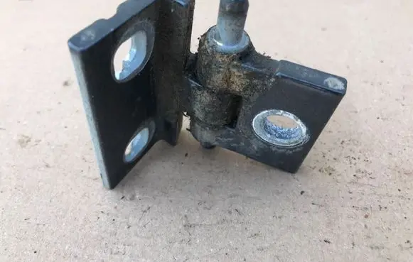 Front door lower hinge