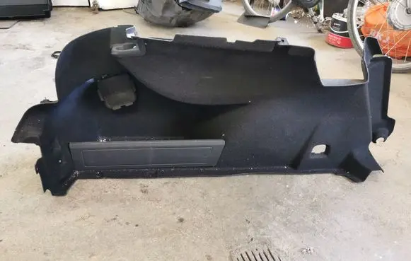 Trunk/boot lower side trim panel