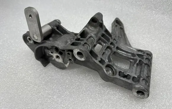 Audi RS5 A/C compressor mount bracket 06M260885AF