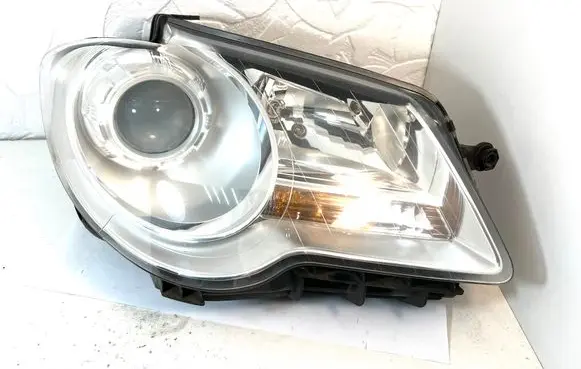 Volkswagen Touran I Headlight/headlamp 0301233602 1T2941006B