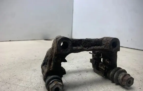 Opel Meriva A Brake caliper pad carrier rear 