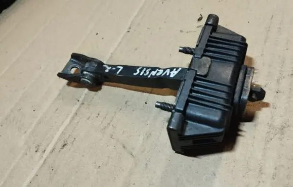 Front door check strap stopper