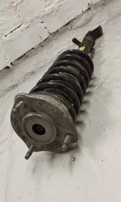 Front shock absorber with coil spring