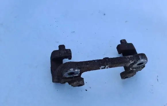 Volvo S60 Front Brake Caliper Pad/Carrier 