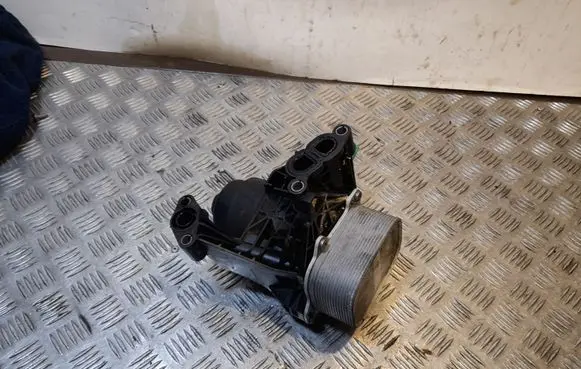 Volkswagen Jetta VI Oil filter mounting bracket 03N117021 03N115389A
