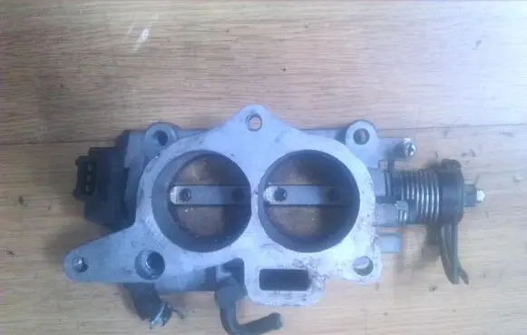 KIA Sephia Throttle valve 0k24718911