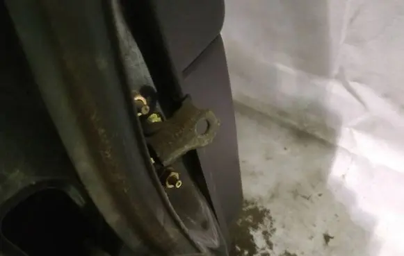 Subaru Legacy Rear door check strap stopper