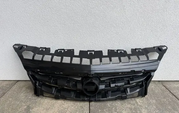 Opel Astra J Front bumper upper radiator grill 13368851