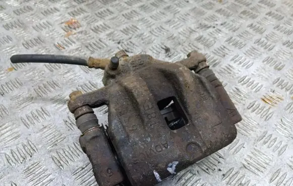 Suzuki Grand Vitara II Front brake caliper