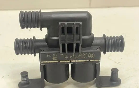 Coolant heater control valve