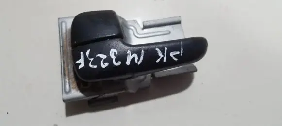Mazda 323 F Front door interior handle