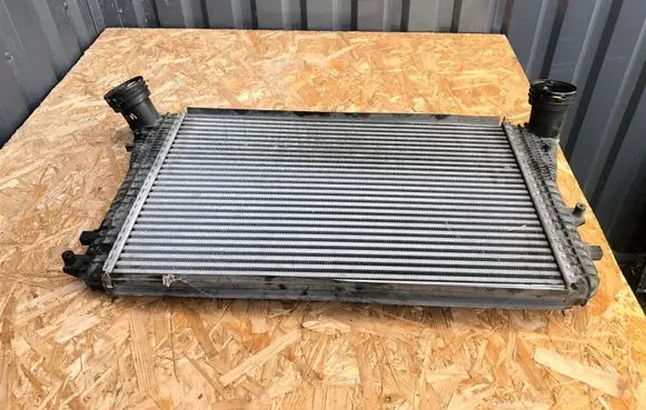 Volkswagen Golf V Intercooler radiator 1K0145803T