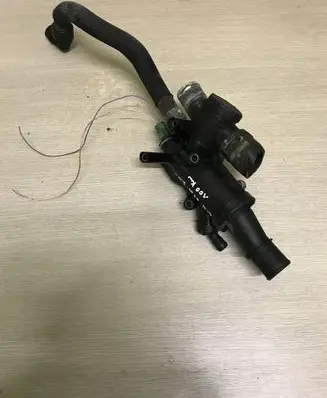 Thermostat/thermostat housing